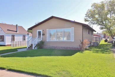 1203 6th St SW, Minot, ND 58701 - photo 2