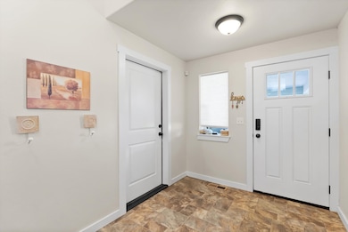 Front Foyer. Garage Entrance Door on the Left.
