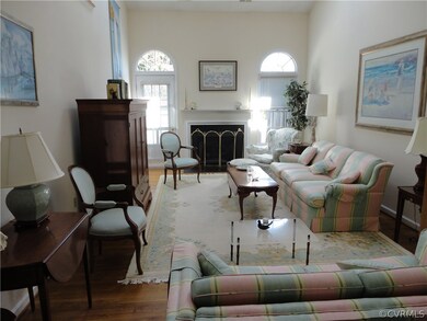 Living room with vaulted cathedral style ceilings,