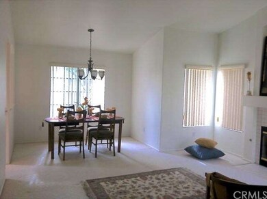 Dining area just off living room adjoins kitchen a