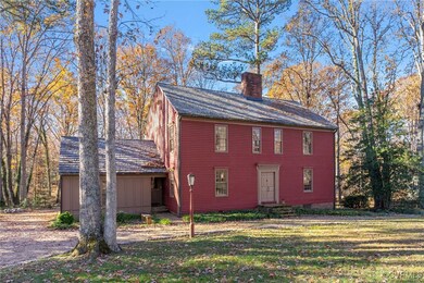 View of front of house with a front yard