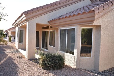 2 Bay windows and a covered patio