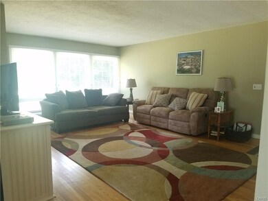 Full view of living room with wall of windows!  Lo