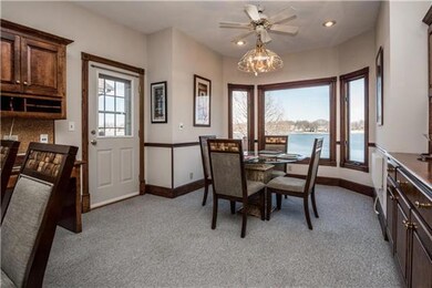The breakfast room is stunning with a built-in buf