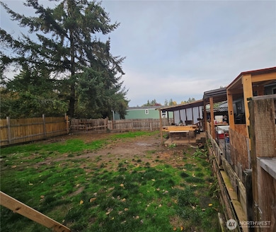2nd portion of back yard w/porch fully fenced
