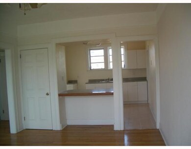 LIVING-DINING AREA AND OPEN KITCHEN