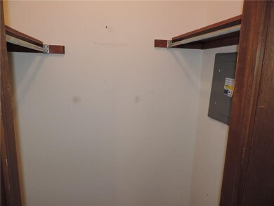 Walk-in closet in bedroom.