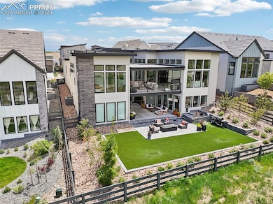 Fenced yard backs to open space