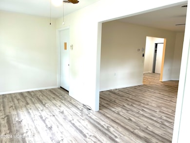 Archway opens to Living room/dining room