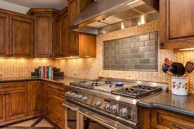 ^ 6 Burner Gas Cooktop & Griddle