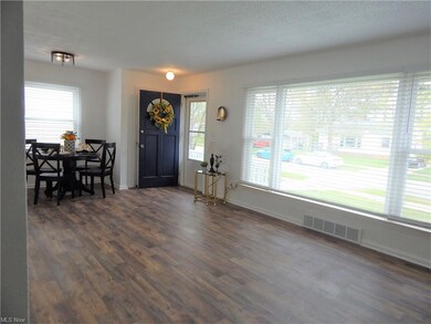 Gorgeous warm & inviting all NEW Luxury flooring greets you and follows you thurout  the entire home, for easy living and care.