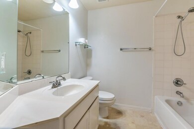 Full bathroom with tile patterned flooring, vanity