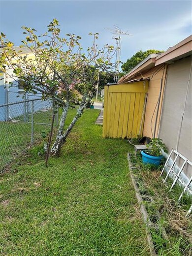 Left Side View leading to backyard