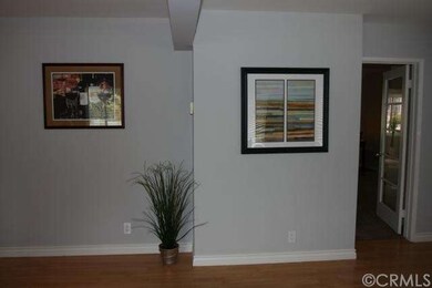 Living room with entrance to Master Bedroom