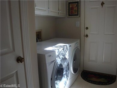 Laundry Room. laundry is located right between garage and kitchen - great for unloading anything from groceries to muddy boots