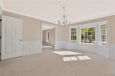Dining Room with bay window facing the front yard.