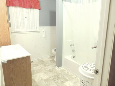 Full bath with extra wide door