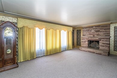 Light and bright living room with huge front windo