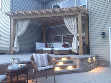Backyard comfy seating under pergola