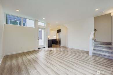 Large open living space with convenient kitchen access