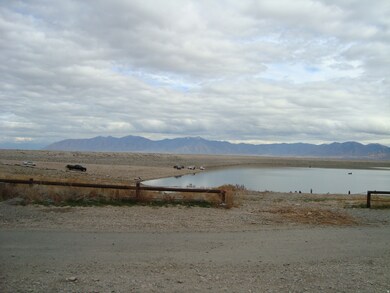 Mountain view featuring a nearby body of water
