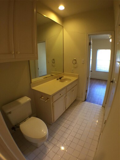 Bathroom featuring recessed lighting, tile patter