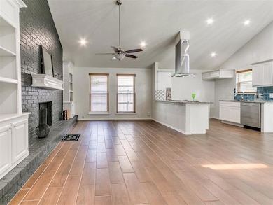 Unfurnished living room with vaulted ceiling, ceil