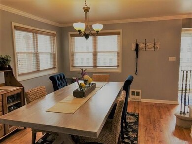 Beautiful dining room that flows into the kitchen.
