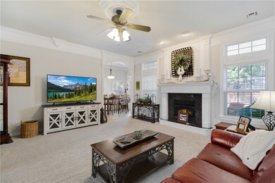 Large living room with gas log fireplace.