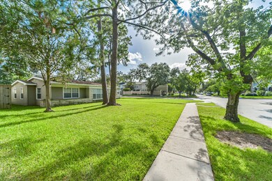 Sidewalks surround the property and continue throu