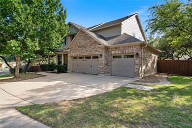 View of front facade featuring an attached garage