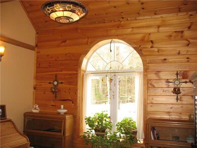 Entry. Note V matched pine wall