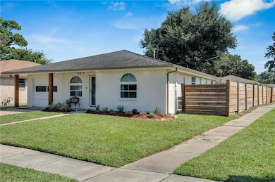 Corner lot with rare rear yard access.