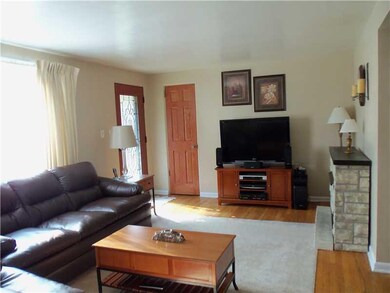 Living Room. Hardwood Floors and Plaster Walls Thr