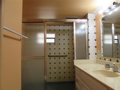 Main bathroom has large walk in shower.