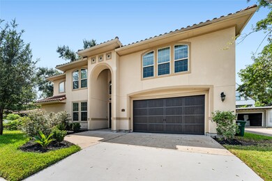 Stucco elevation, 2 story covered entry, mature tr