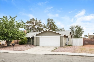 Single story home with a garage, stucco siding, co