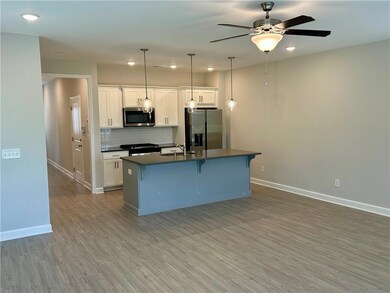 Kitchen featuring appliances with stainless steel 