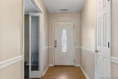 View of wood floored entryway