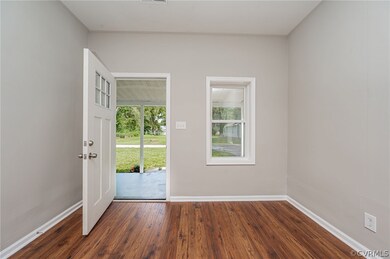 Living room view to entrance of home and 22X7 fron