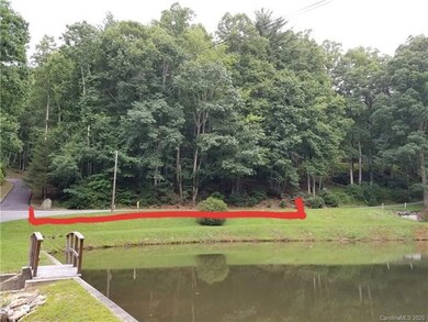 Driveway goes up along the property on the left.