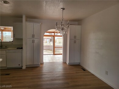 Unfurnished dining area with wood finished floors,