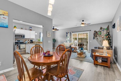 Dining space featuring light wood-type flooring, a