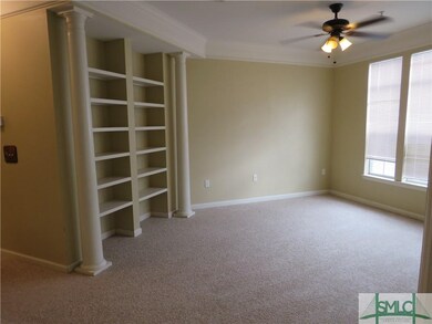 Living room with built in shelves.