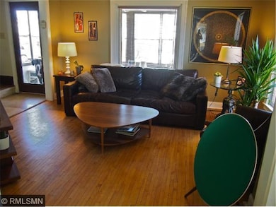 Main - Living Room II, showing Front Porch & stair