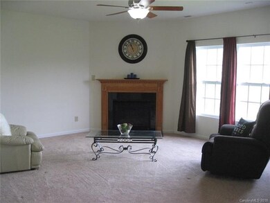 Family room  open to the kitchen with gas fireplac