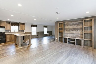 From living room you can see the open Kitchen and 