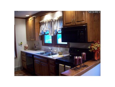 Custom updated kitchen. Efficient galley features 