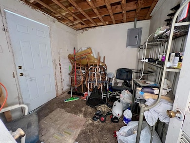 Laundry Room - Also has back yard access.
