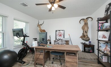 To your left, you'll find this versatile space, ideal as a tranquil home office or an optional fourth bedroom, tailored to your lifestyle needs.